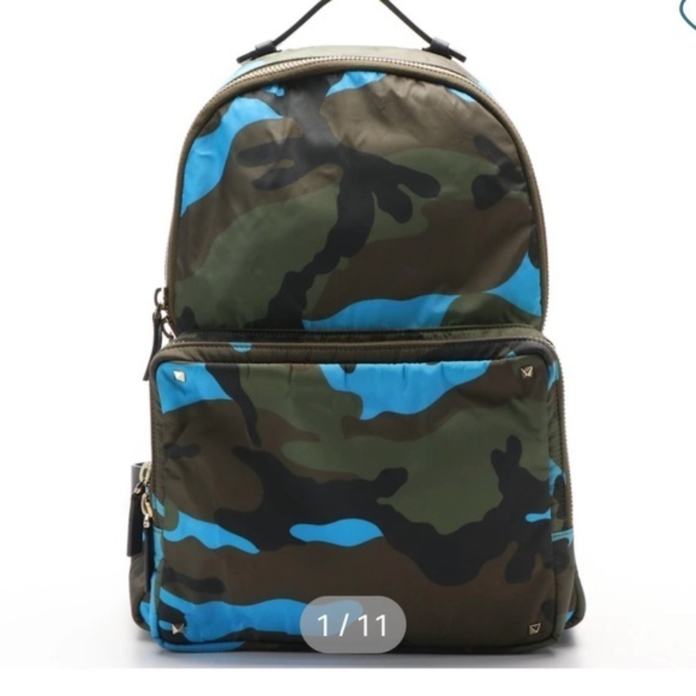 Valentino Garavani with COA nwot. Has hang tag and luggage tag. Unisex. Bookbag